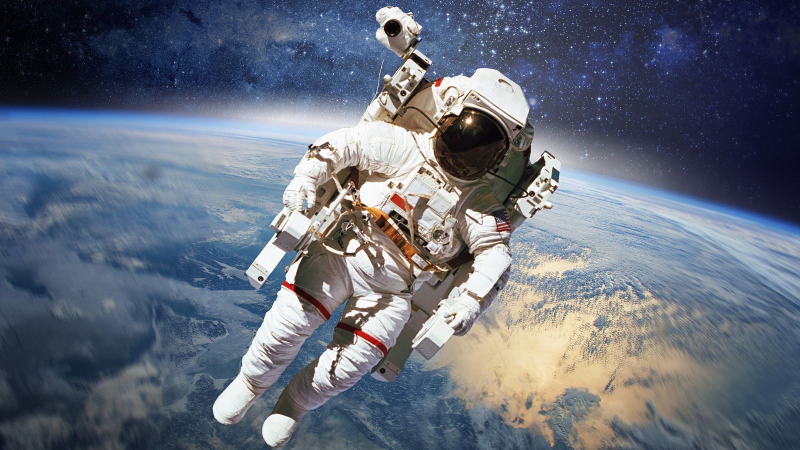 Why spaceflight accelerates aging: new clues from worms and human cells